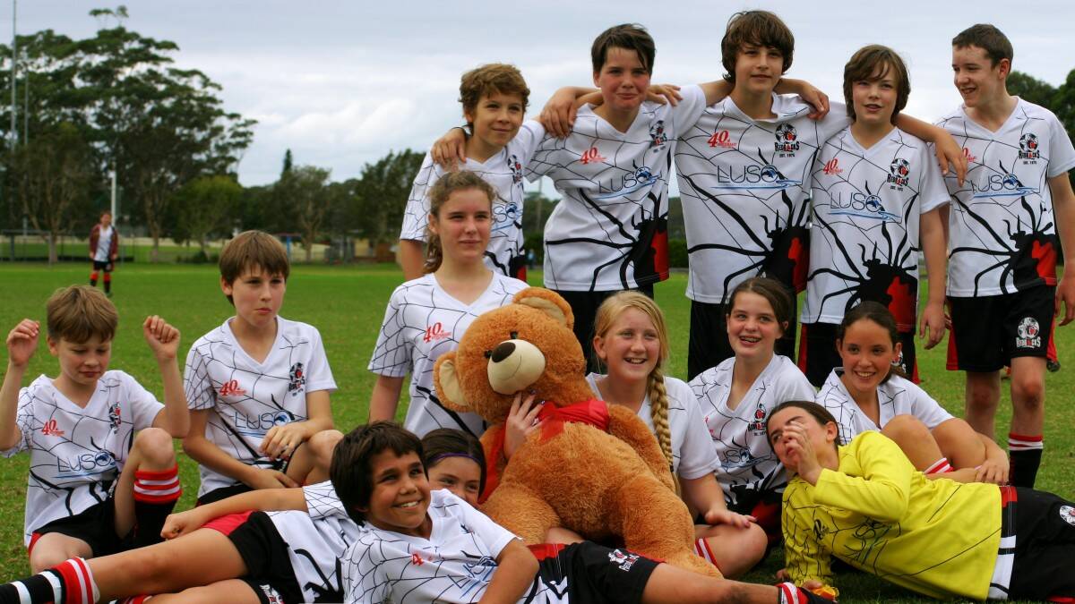CHAMPIONS AT HEART: Back row - Alexander Knight-Viale, Max Ferguson, Iean Bon, Patrick Maxwell, Ethan Morson. Middle row - Braydon Woudsma, Jarred Spilsbury, Lucy Falco, Maddison Symons, Saige Ferguson, Amber Currie. Front row - Elizabeth Lee, Sachin Heath, mascot teddy (out of uniform for this shot due to laundry delays) and Jada Moore.