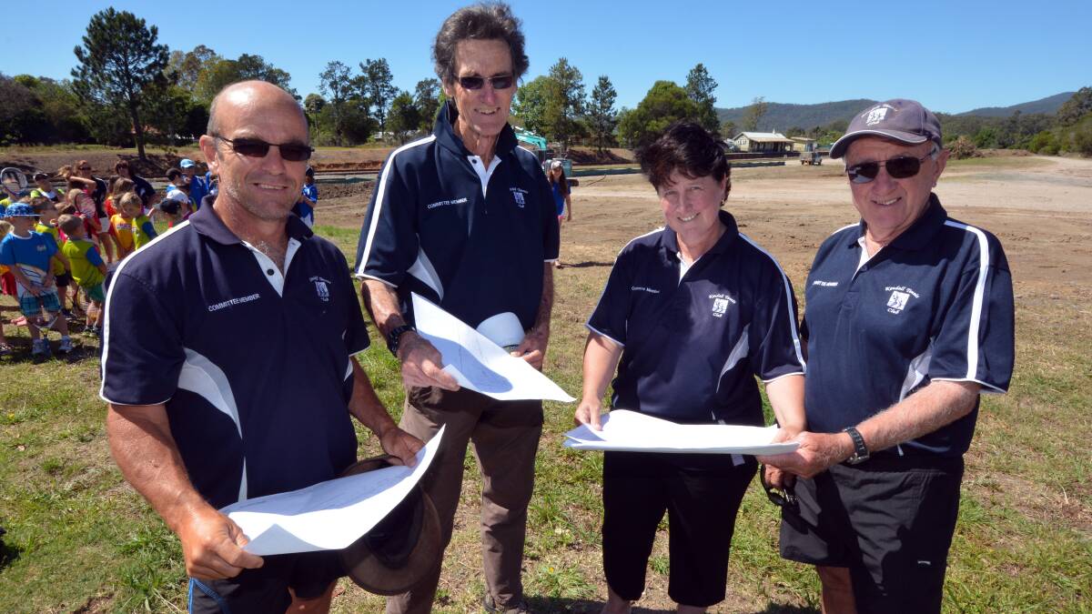 NO MORE WAITING: Kendall Tennis Club committee members Phil Robinson, John Manderson, Wendy Hudson and Roger McCosker look over the plans for the expanded tennis club.
