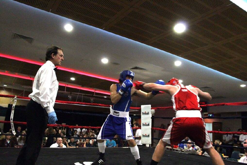 ACTION: Boxers during the last Central Titles held in Laurieton in 2015. This Saturday's event will see 28 bouts take place.