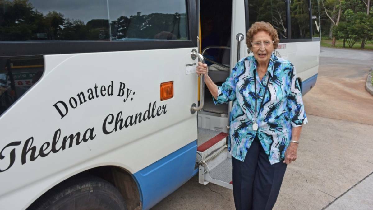 Wonderful legacy: Thelma Chandler heading out for her 105th birthday celebrations in the bus she donated to the Camden Haven Social Seniors and Friends.