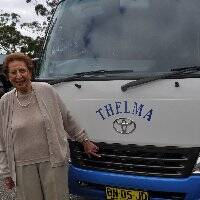 All shiny and new: Thelma Chandler with the bus funded by her $100,000 donation.